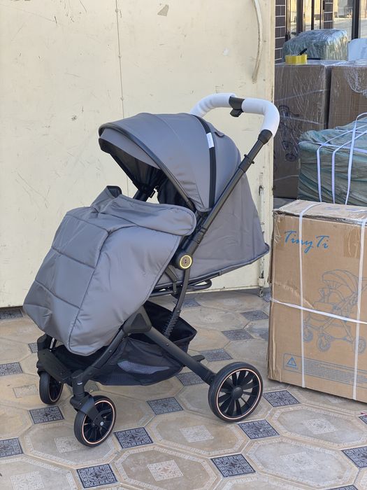 Прогулочная коляска Tiniti M7 — лёгкость, стиль и комфорт в пути!