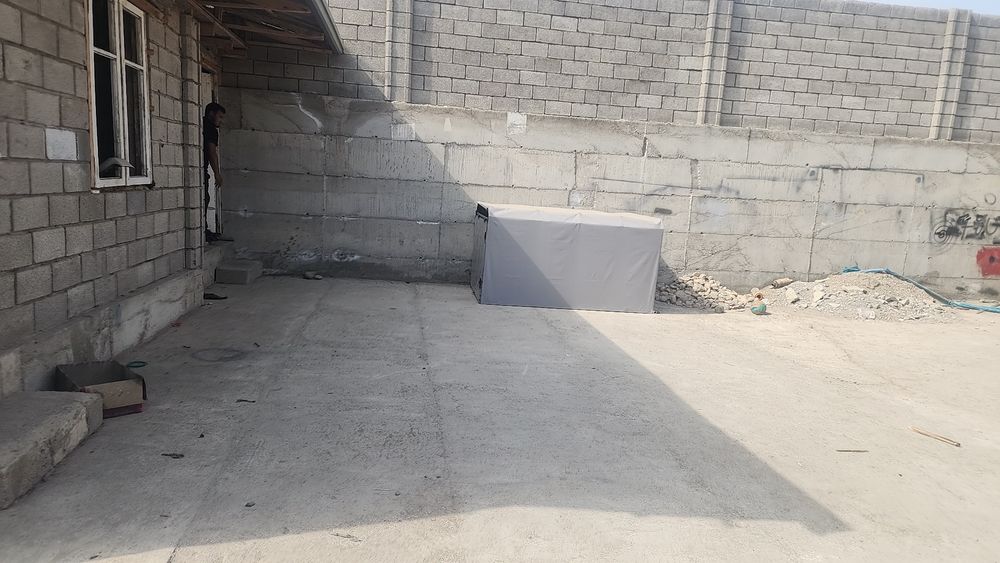Labo orqasiga tent