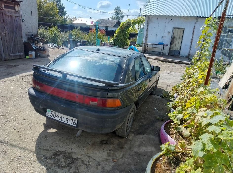 Мазада 323f bg (слепая)
