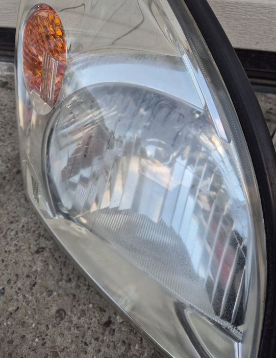 Faruri Originale Toyota Land Cruiser J120. 2002-2009.  Volan stinga.