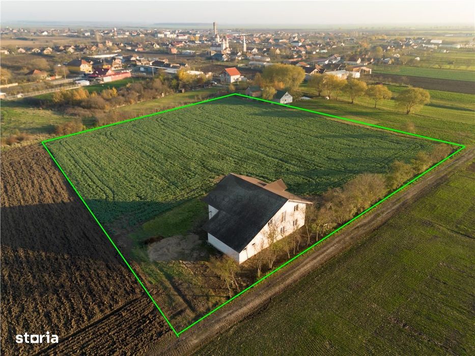 RECO casa Inand la rosu cu teren imens