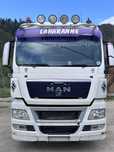 MAN TGX 18.440 4x2 BLS Ansamblu cap tractor MAN TGX 18.440 + semiremorcă Schmitz Cargobull