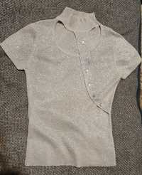 Продам блузку с серебряными нитями 42 размер