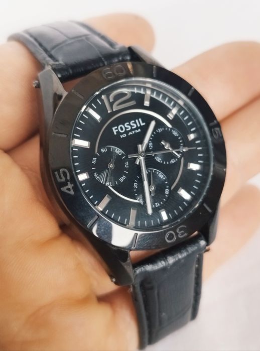 Ceas bărbătesc Fossil CE1003 ceramic, cu quartz si curea din piele.