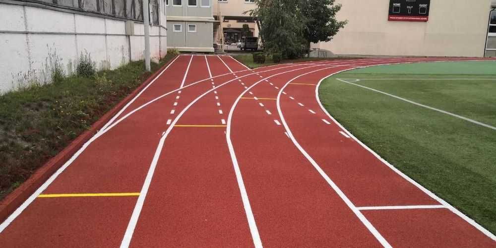 Тартановое -Резиновое покрытие