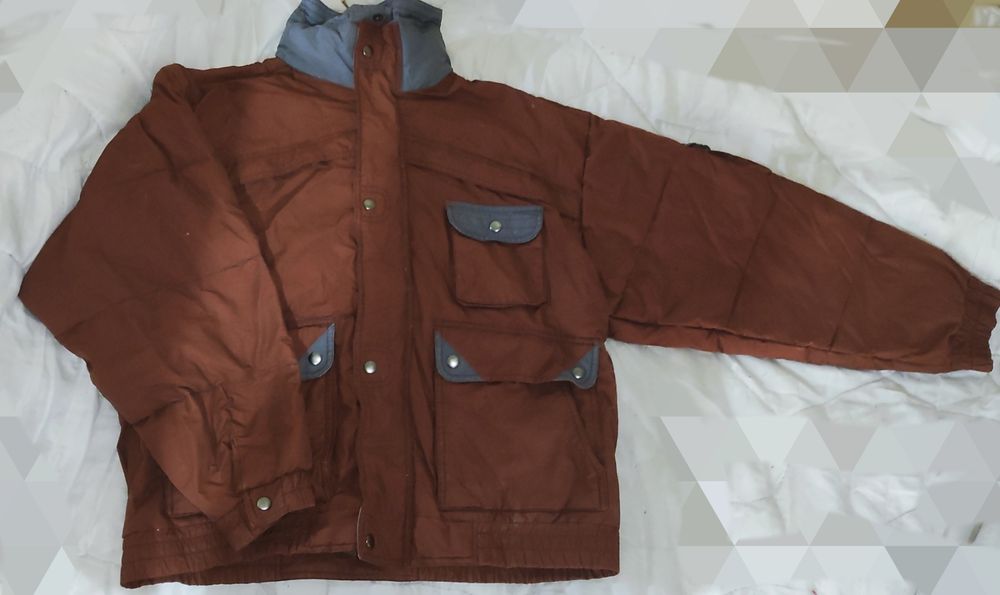 Пуховик много карманов теплый 48-50 недорого.