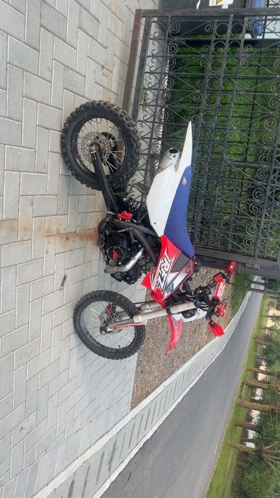 Cross RXT 125cm³