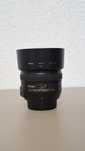 Obiectiv Nikon 50mm f1.4 cu parasolar si capace fata-spate