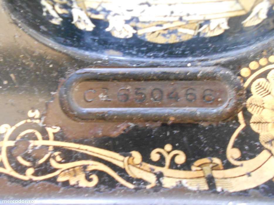 masina de cusut singer