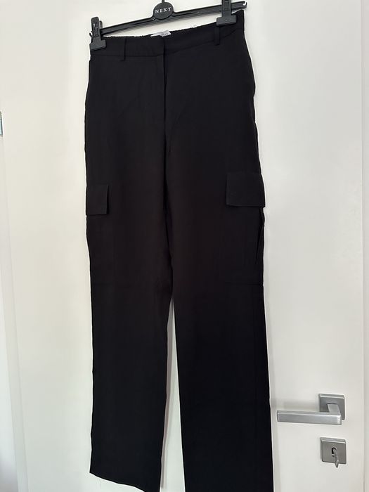 Pantaloni Reserved stil cargo cu buzunare laterale