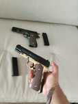Pistoale metal cu bile și propulsie arc Glock sau Colt + 500bile ABS