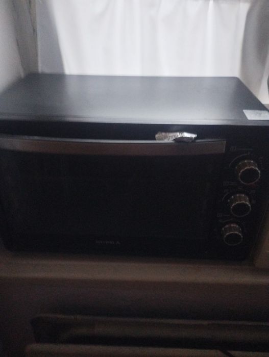 Продам электрическую  духовку.