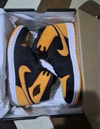 Jordan 1 mid black/vivid/orange