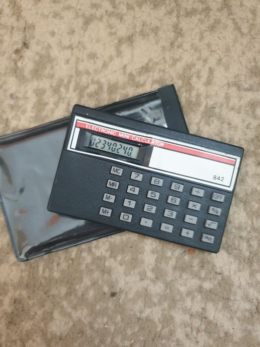 mini calculator electronic de epocă