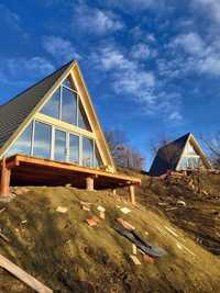 Construcții case si cabane de lemn