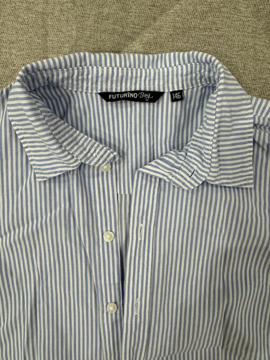 Продается рубашка на мальчика с коротким руковом. Размер 146