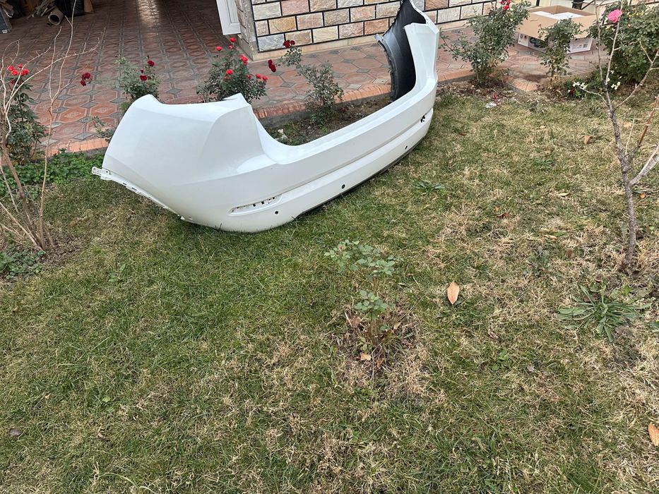 Продам новый задний бампер на L7.