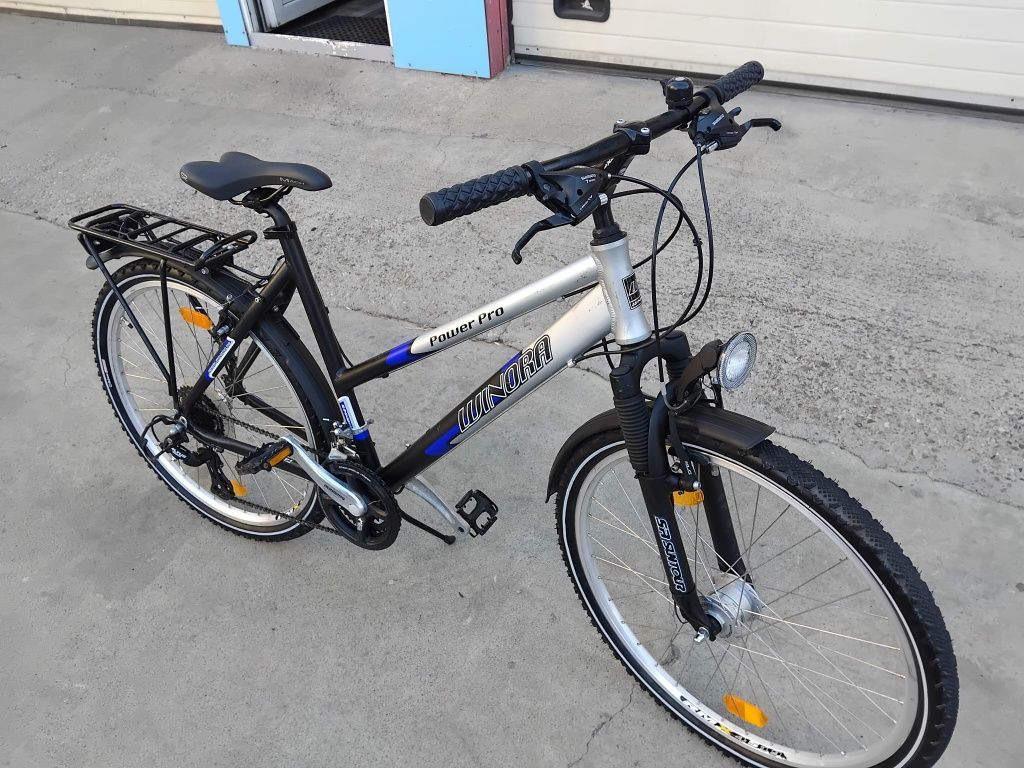 Vând bicicleta din aluminiu pentru damă