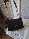 Geanra  de  dama  marca  guess