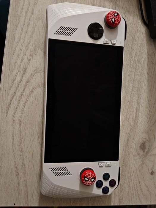 Vând consola Asus Rog Ally Z1 Extreme / schimb cu nintendo switch 2