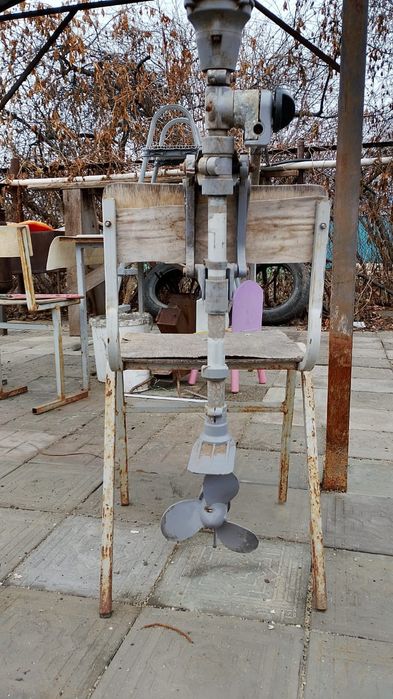 Крепление на тример для моторной лодки;