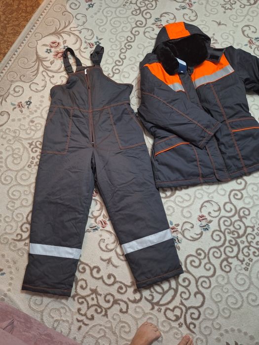 Продам комбинезон новый, зимний