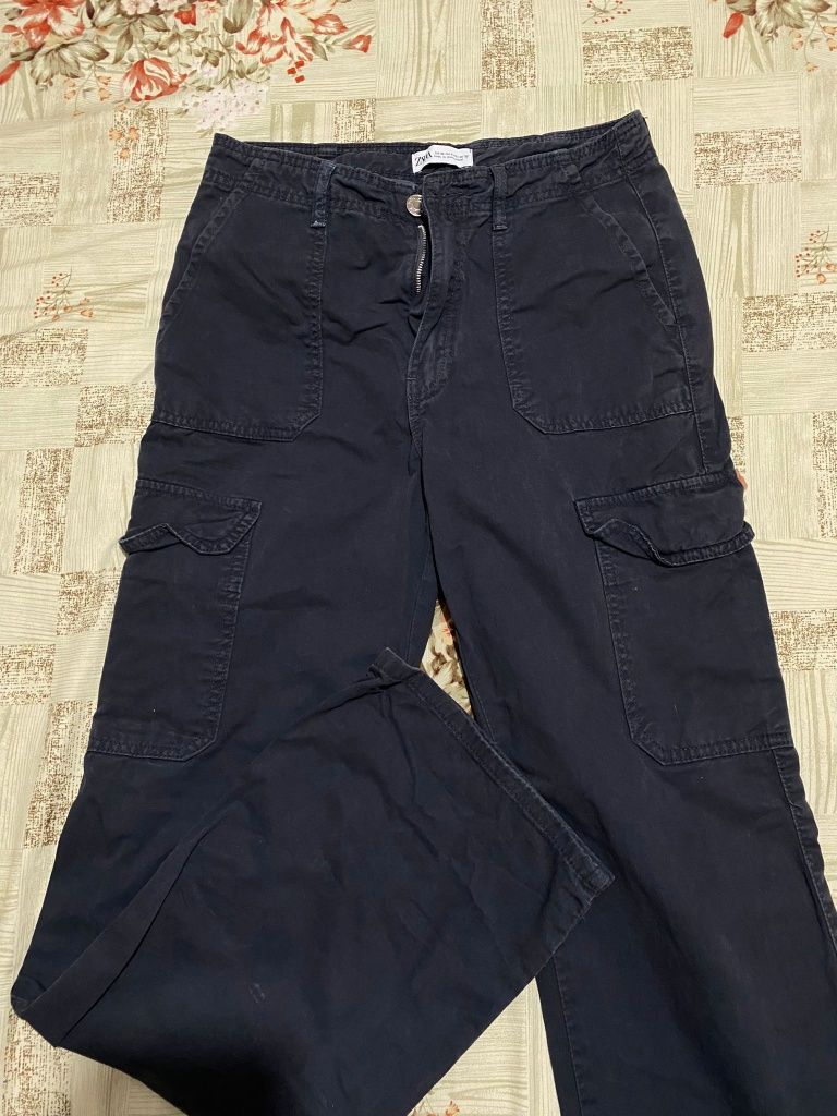 blugi Zara, Cargo