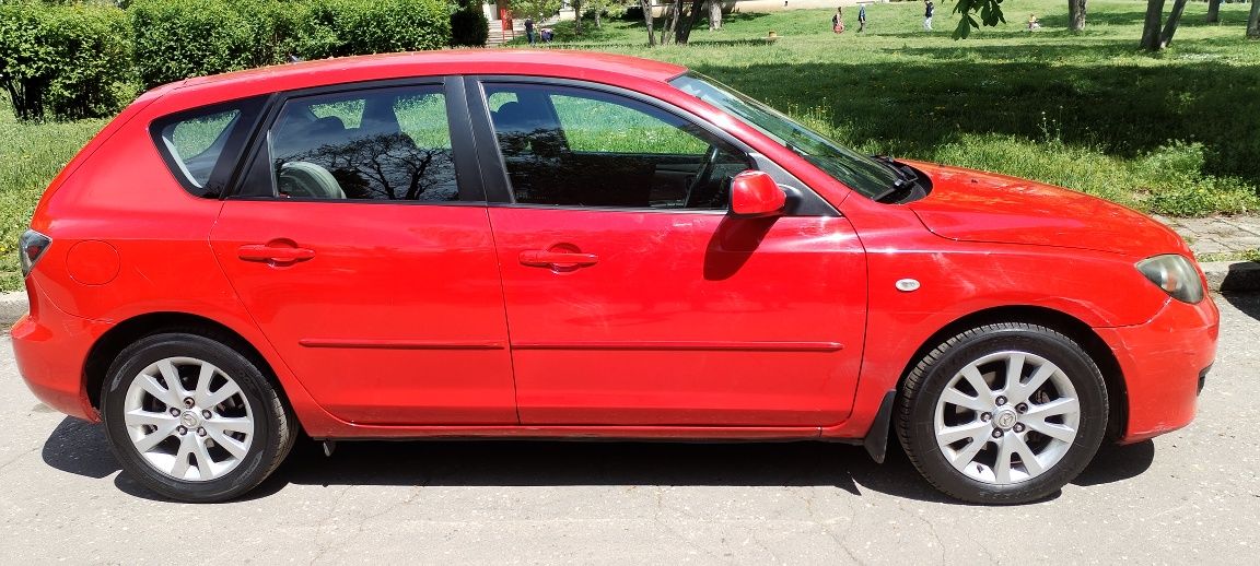 Автомобил Мазда 3