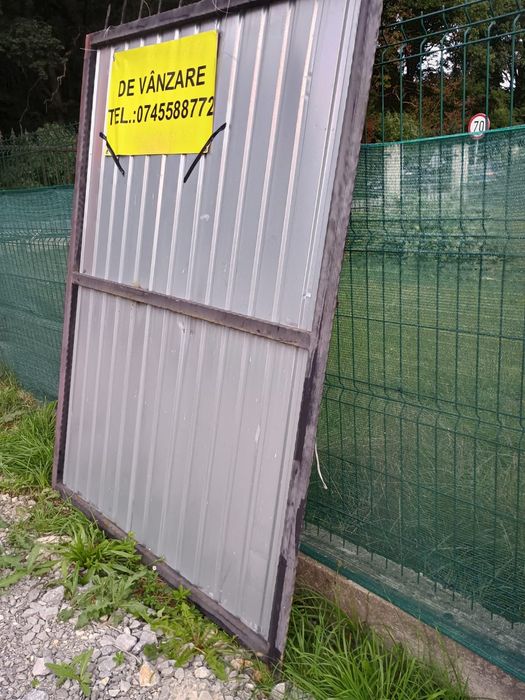 Vând poarta detalii la telefon
