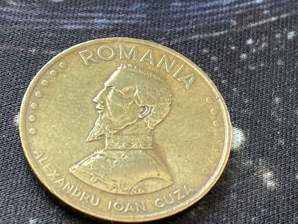 Monede de 1 leu si una de 50 lei