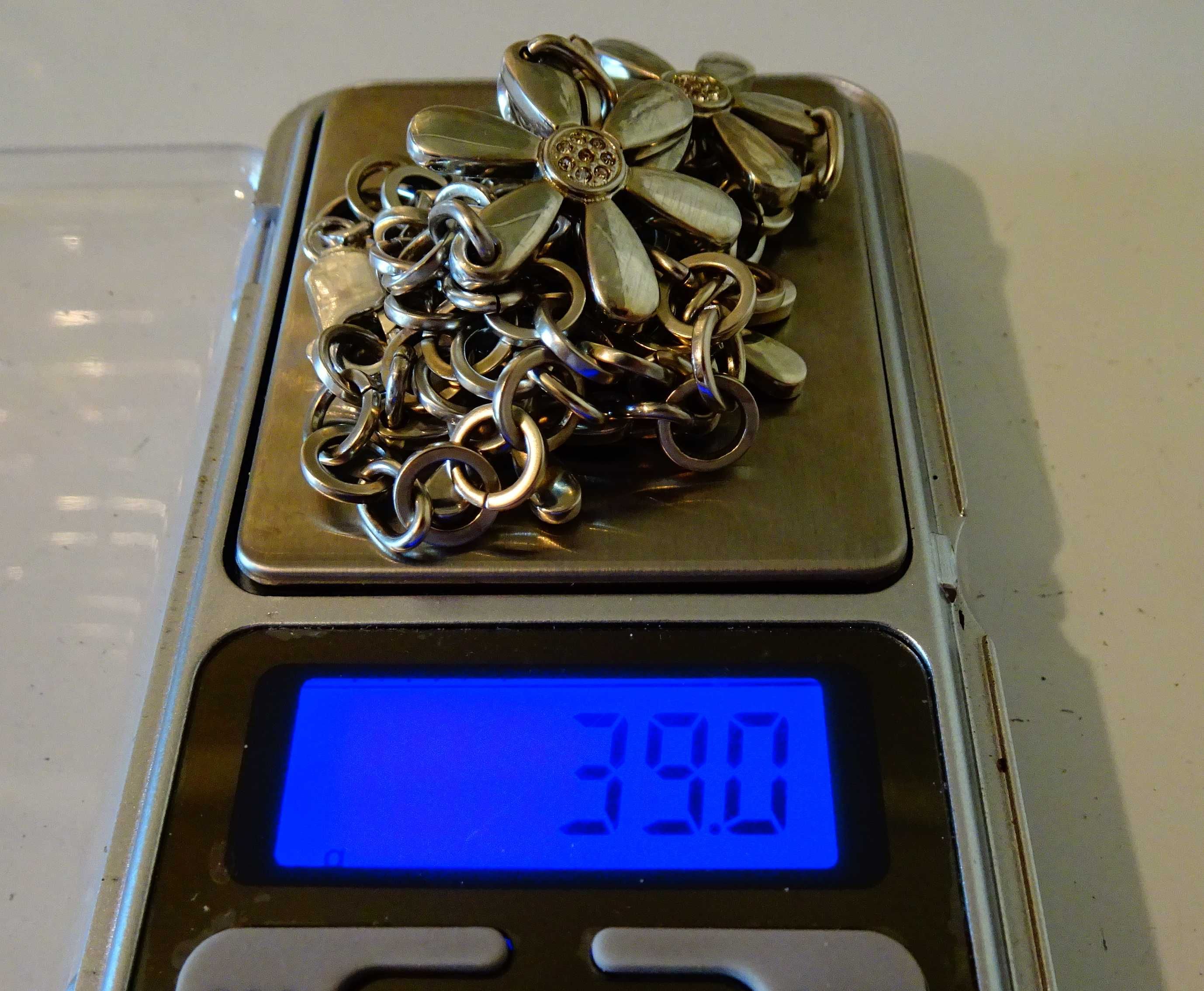 Сребърно колие 925, циркони, цветя, 39 грама.