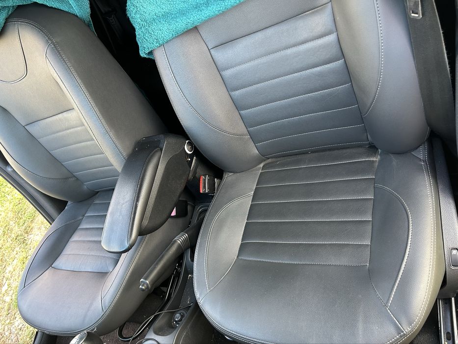 Schimb & Vand scaune  piele cu incalzire Duster cu textil