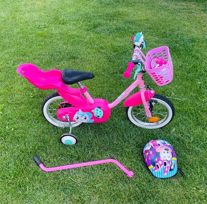 Bicicleta Btwin roz ,cu accesorii