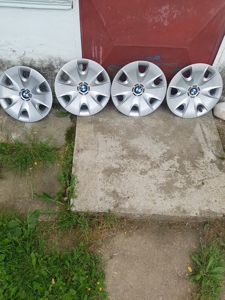 Jante de otel pentru BMW de vanzare cu capace sI anvelope de 215/55/16