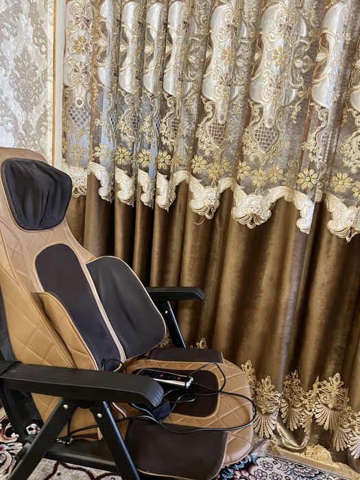 Массажный кресло