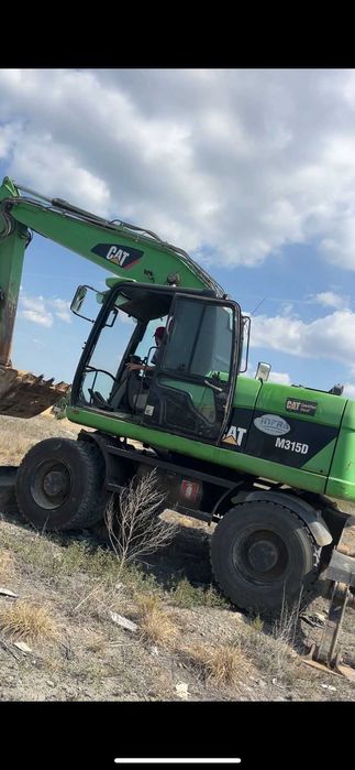 Аренда колесного экскаватора Caterpillar M315D