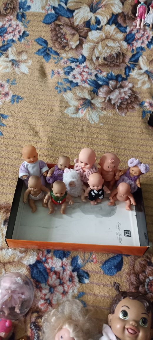 Продаю   кукол  маленьких цена за всех