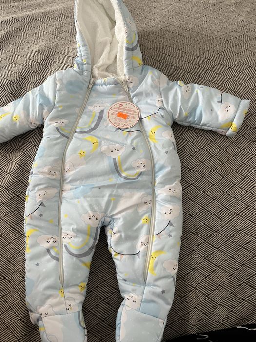 Продам новый турецский комбинезон на осень