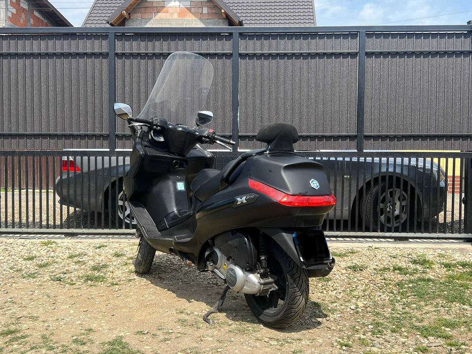 Scuter cu B-ul de 125 cc Piaggio X-EVO Transport gratuit