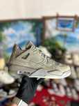 Jordan 4 Kaws Grey