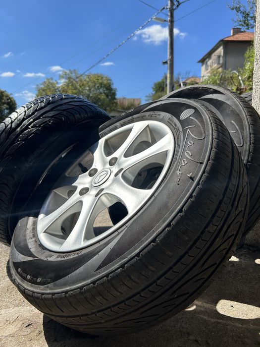 4бр. Алуминиеви джанти с гуми 195/65 R15 цола от Mazda