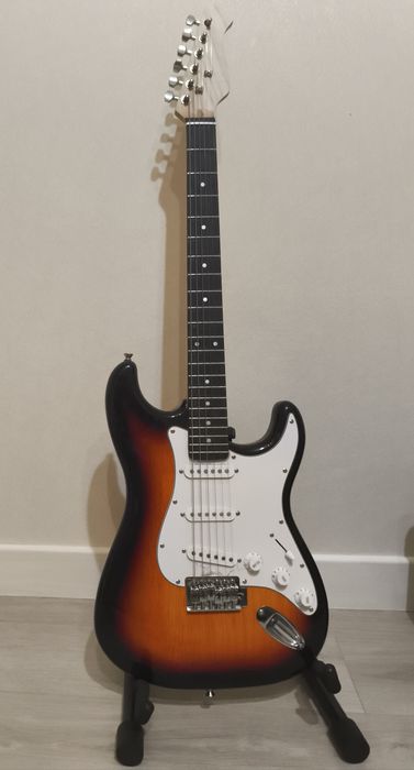 Электро гитара .