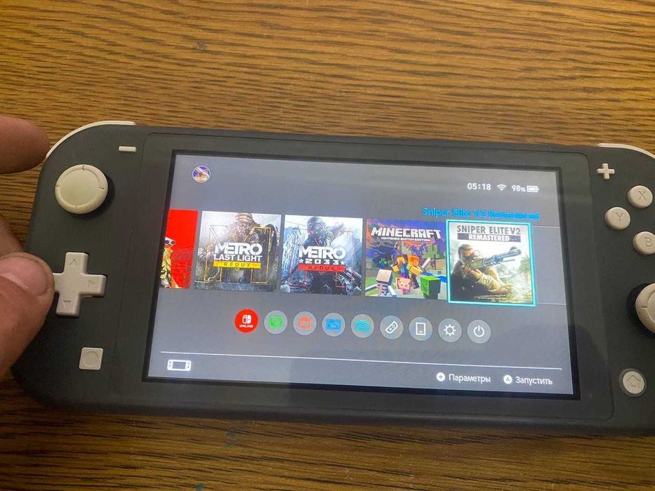 Nintendo switch lite чипованая с играми.