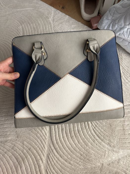 Geanta de mana impecabila