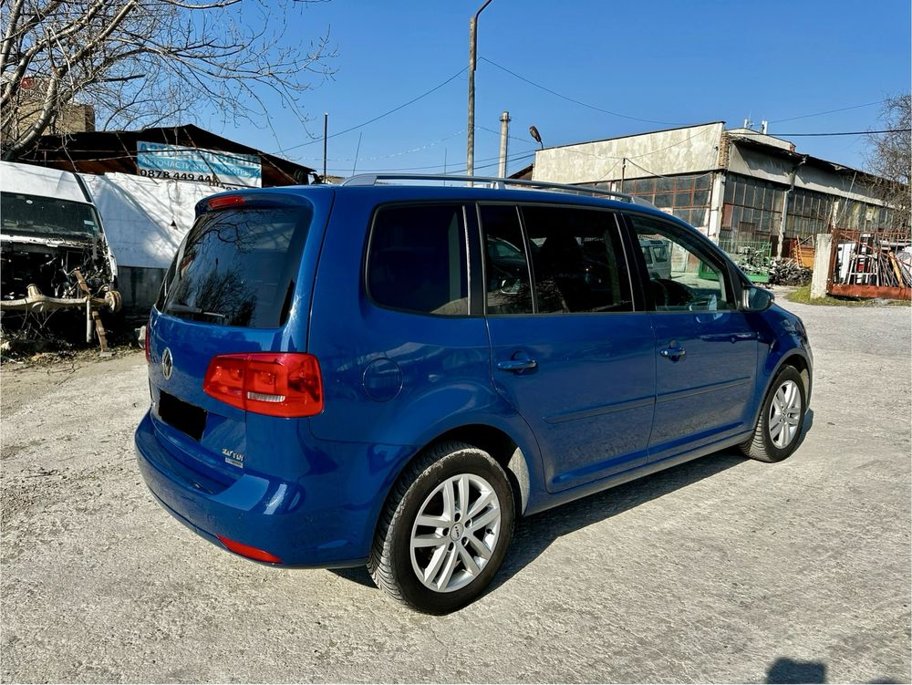 VW Touran 2.0TDI Bluemotion 2012г Фолксваген  Туран 140кс