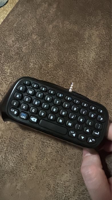 Tastatura Bluetooth pentru controller de PS4.
