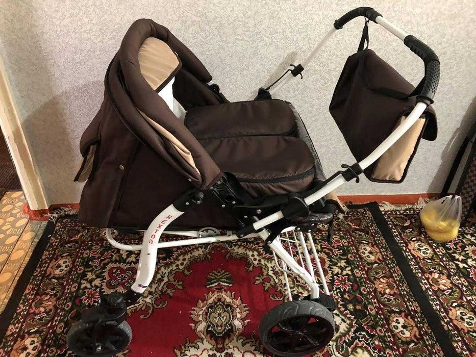 Коляска двухместная