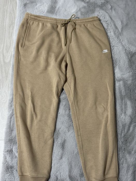 Pantaloni Nike Maro deschis