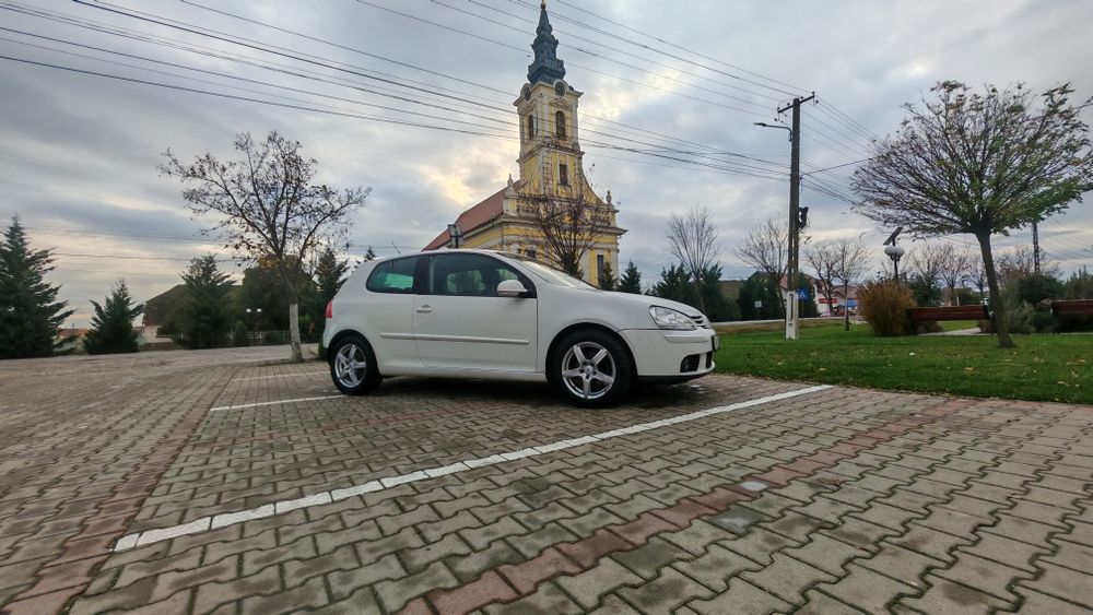 Vw golf 5 an 2009  1.4 benzina