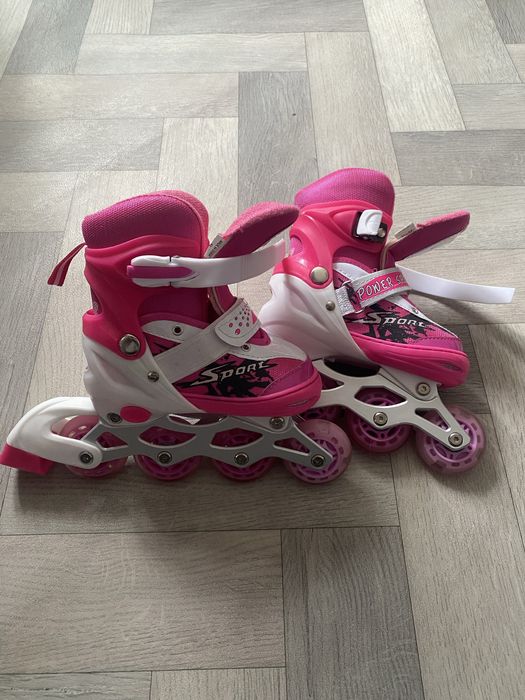Продам новые детские ролики с регулировкой размера (31–34), розовые